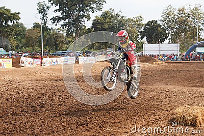 Phichit,Thailand,December 27,2015:Extreme Sport Motorcycle,The motocross competition,motocross rider jump. Editorial Stock Photo