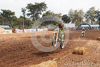 Phichit,Thailand,December 27,2015:Extreme Sport Motorcycle,The motocross competition,motocross rider jump. Editorial Stock Photo