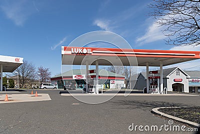 Lukoil Petrol Station sign. LUKOIL is a major international oil & gas company Editorial Stock Photo