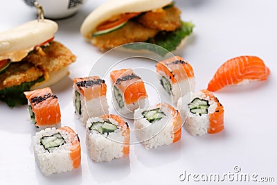 Philadelphia roll with cucumberon and appetizing fresh sushi white background. Sushi menu. Japanese food Stock Photo