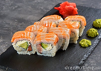 Philadelphia roll sushi with salmon, prawn, avocado, cream cheese. Sushi menu. Japanese food. Stock Photo