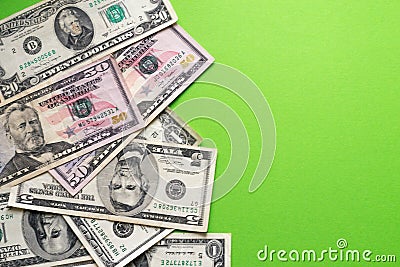 Philanthropist concept - dollars banknotes on green background. Copy space for text. Exchange rates in bank. Ð¡harity for nature Stock Photo