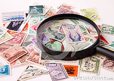 Philatelist considering the collection of stamps. Editorial Stock Photo