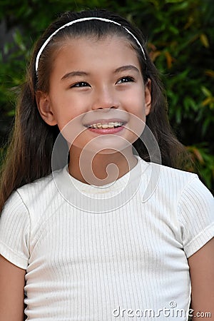 A Philippina Girl Child Smiling Closeup Stock Photo