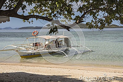 Philippine boat on the beach on island Editorial Stock Photo