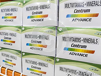 Philippines - An array of Centrum multivitamin and mineral supplement boxes neatly organized on a store shelf Editorial Stock Photo