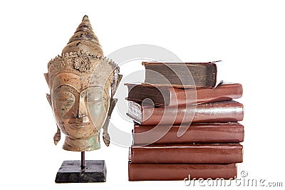 Philosophy and wisdom. The philosopher Buddha with ancient theology text books. Stock Photo