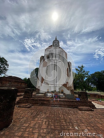 Phitsanulok, Thailand, 21 June 2020, a large white cement Buddha with old Set up outdoors at Royal Palace Chan Editorial Stock Photo