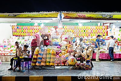 Image of fair games in Phnom Penh Cambodia. Image at night of colorful recreation activities. Editorial Stock Photo