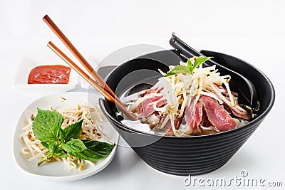 Pho - Vietnamese Rare Beef noodle soup Stock Photo