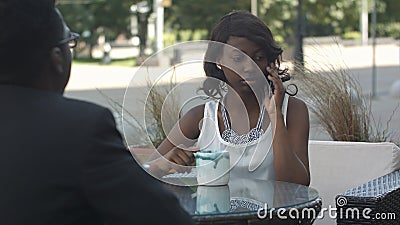 Confident afro american administrative manager of trading corporating working during work break waiting for telephone Stock Photo