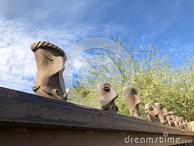 Creative Fancy Fence Heads Editorial Stock Photo