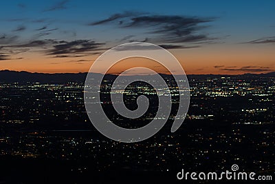 Phoenix Cityscape at Evening Dusk with Illuminated Urban Skyline Stock Photo