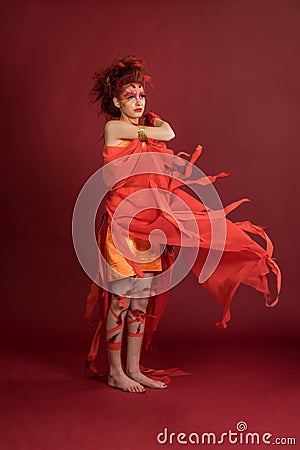 Phoenix woman. Flaming young girl Stock Photo