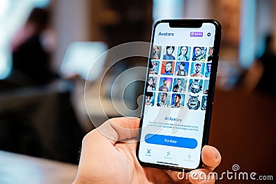 Phone with AI app Avatars Editorial Stock Photo