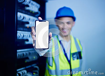 Phone, app and a man IT engineer in a server room for cyber security, maintenance or to install software. Mobile Stock Photo