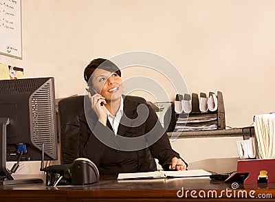 Phone assistant administrator woman in office Stock Photo