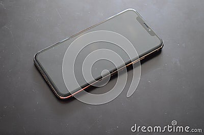 Phone on a black background, successful life Stock Photo