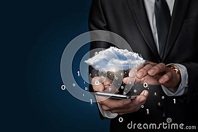 On the phone businessman working with cloud computing with binary code on blue background Stock Photo