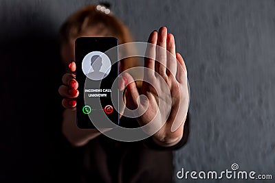 Phone call from unknown number. Scam, fraud or phishing with smartphone concept. Prank caller, scammer or stranger Stock Photo