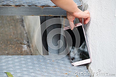 Phone fell on the steps Stock Photo