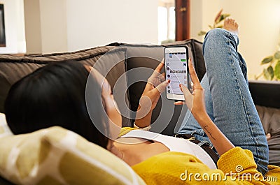 Phone, hands and woman on social media on sofa in home living room, typing or texting. Cellphone, relax and person or Stock Photo