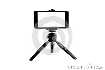 The phone is mounted on the stand of the device. To make it easier to shoot and still be able to shoot themselves. clipping path. Stock Photo