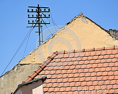 Phone pole on the roof Stock Photo