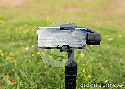 Phone on a tripod taking photo of usual rural England landscape in Yorkshire Stock Photo