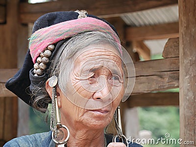 Phongsaly, Laos - november 2, 2019: portrait old woman wearing traditional turban belonging to minority ethnic group living in Editorial Stock Photo