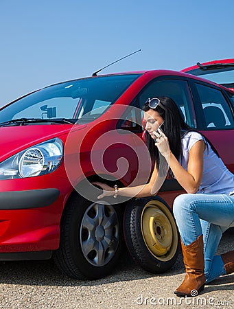 Phoning for car breakdown help Stock Photo