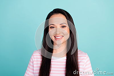 Photo of adorable pretty mixed race mestizo lady dressed striped t-shirt smiling isolated teal color background Stock Photo
