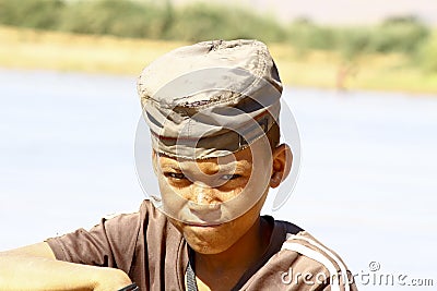 Photo of adorable young happy boy - african poor child Stock Photo