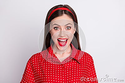 Photo of amazed funny lady open mouth look camera wear red dotted vintage blouse isolated grey color background Stock Photo