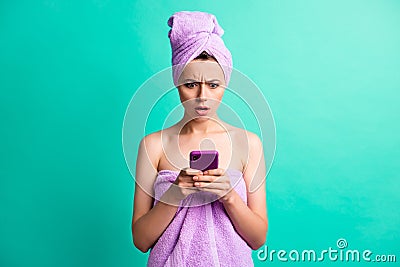 Photo of amazed young lady morning shower hold telephone late date wear violet towels teal color background Stock Photo