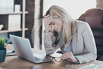 Photo of amazing blond business lady holding head on hand tired feel dizzy overwhelmed assistant notebook table sitting Stock Photo