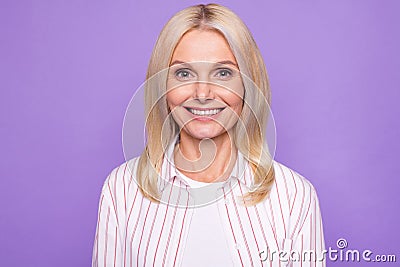 Photo of amazing mature age lady white teeth smile wear striped shirt isolated pastel purple lilac color background Stock Photo