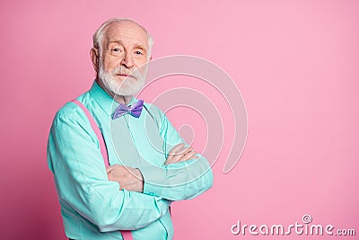 Photo of amazing stylish look grandpa hands crossed seriously facial expression wear mint shirt suspenders violet bow Stock Photo