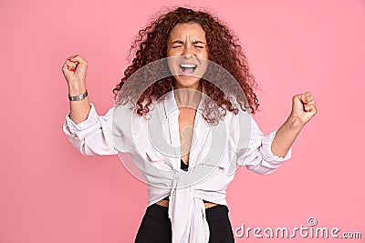 Photo of amazing wild lady yelling loud not fair situation, arms fists raised forward I would kill you, wear casual clothes Stock Photo