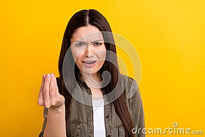 Photo of angry unhappy furious mature woman make italian sign argument isolated on yellow color background Stock Photo