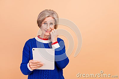 Photo of anxious embarrassed woman use modern gadget oops error 404 empty space isolated on beige color background Stock Photo