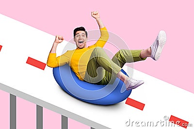 Photo of astonished satisfied person slides down road raise fists isolated on pink background Stock Photo