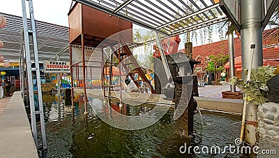 Photo of the atmosphere of a fish pond for therapy on a tour Editorial Stock Photo