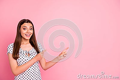 Photo of attractive cute nice girl showing two forefingers at once at something that is definitely worth your attention Stock Photo