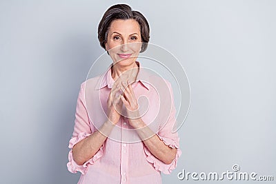 Photo of attractive evil old woman hold hands together genius good mood plan isolated on grey color background Stock Photo