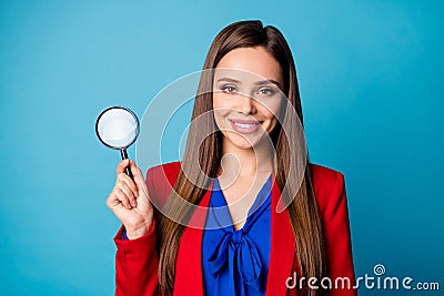 Photo of attractive lady detective agent hold enlarge loupe found crime evidence beaming smiling wear luxury trend red Stock Photo