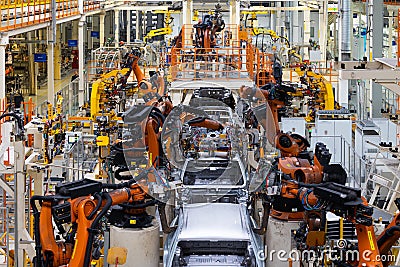 Photo of automobile production line. Modern car assembly plant. Modern and high-tech automotive industry Editorial Stock Photo