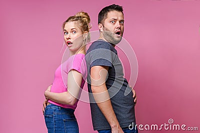 Photo back to back gorged women and men Stock Photo