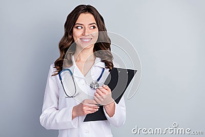 Photo of beautiful cheerful professional doc practitioner lady hold patient papers medical prescriptions look interested Stock Photo