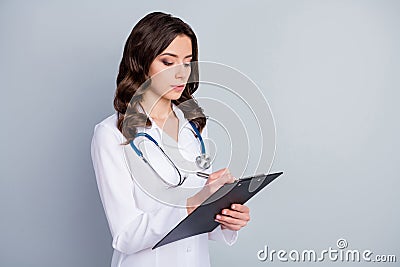 Photo of beautiful family doc lady hold patient papers medical prescriptions writing medicare pills to insurance list Stock Photo